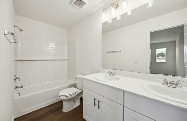 7108 Pederson Creek Way, Denton, TX 76208 - full bathroom with wood finished floors, toilet, shower / tub combination, and double vanity