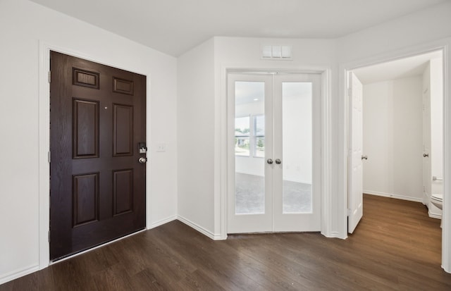 7108 Pederson Creek Way, Denton, TX 76208 - foyer entrance with french doors, dark wood-style flooring, and baseboards