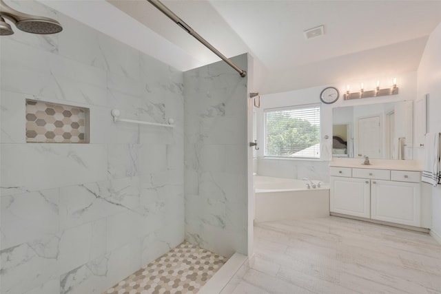 113 Bob White Ct, Rockwall, TX 75087 - full bathroom with a garden tub, vanity, a marble finish shower, and visible vents