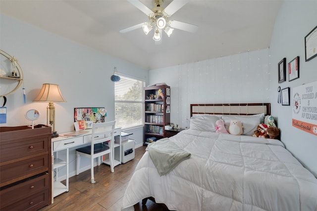 113 Bob White Ct, Rockwall, TX 75087 - bedroom featuring a ceiling fan and wood finished floors
