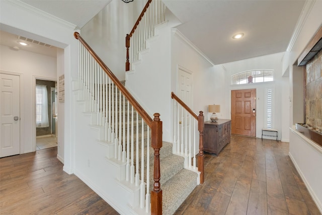 113 Bob White Ct, Rockwall, TX 75087 - entryway with stairway, wood-type flooring, and crown molding