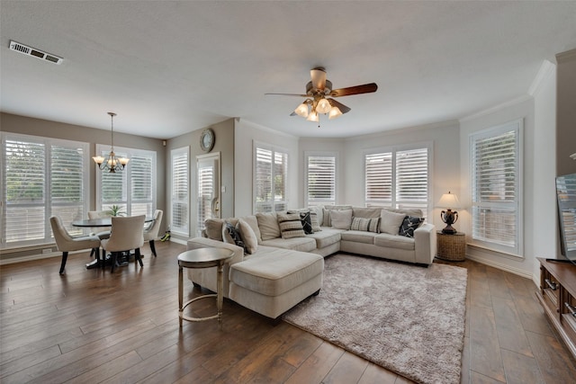 113 Bob White Ct, Rockwall, TX 75087 - living area featuring ceiling fan with notable chandelier, visible vents, a healthy amount of sunlight, and dark wood finished floors
