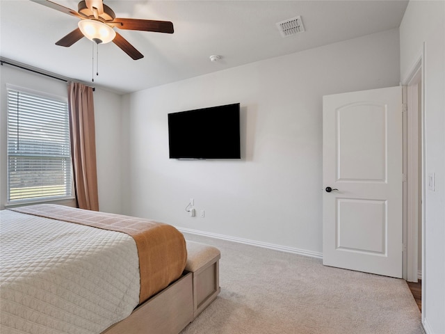 542 Freed Dr, Fate, TX 75087 - bedroom with light colored carpet, baseboards, and a ceiling fan