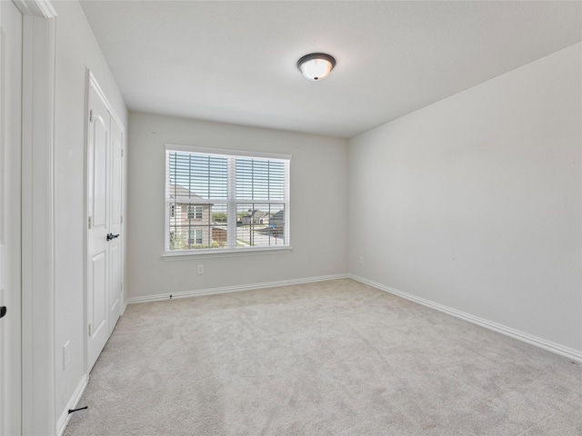 542 Freed Dr, Fate, TX 75087 - unfurnished bedroom with light colored carpet and baseboards