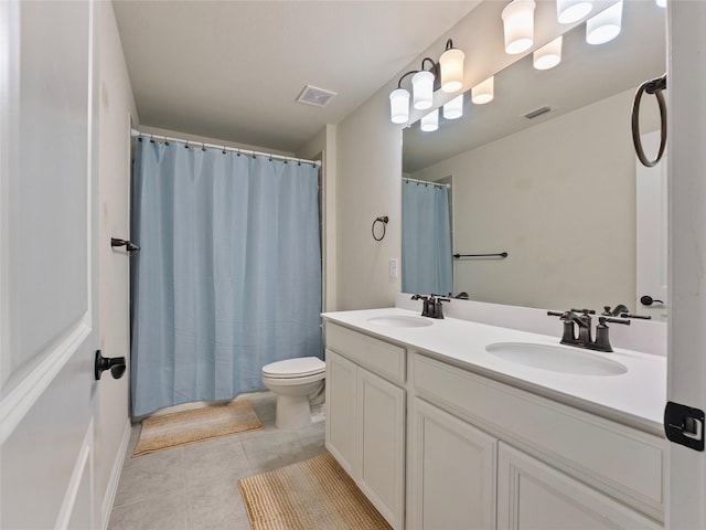 542 Freed Dr, Fate, TX 75087 - bathroom featuring double vanity, toilet, tile patterned flooring, and a shower with shower curtain