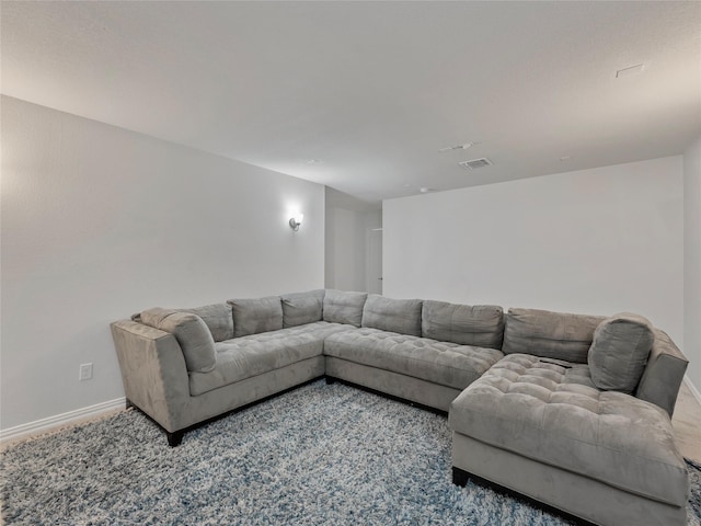 542 Freed Dr, Fate, TX 75087 - carpeted living area with baseboards