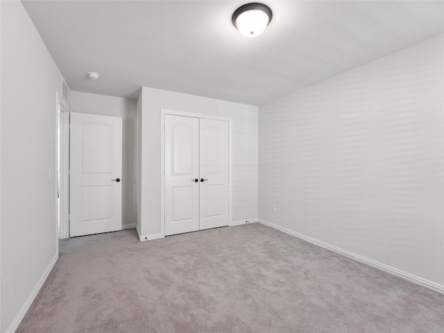 542 Freed Dr, Fate, TX 75087 - unfurnished bedroom with carpet flooring, baseboards, and a closet
