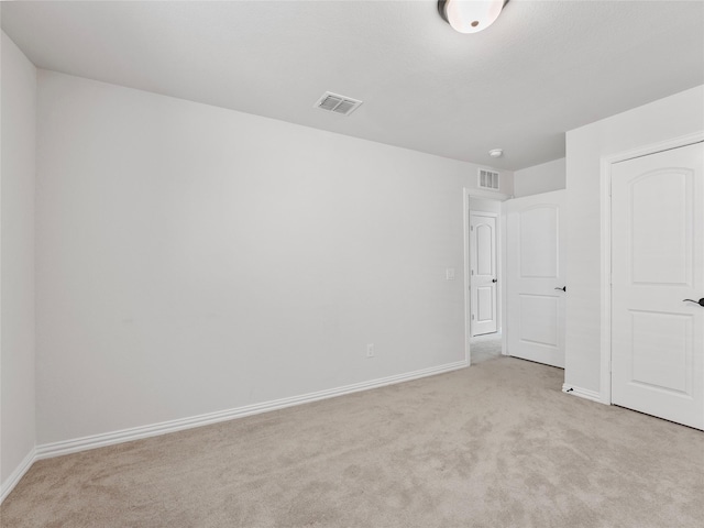 542 Freed Dr, Fate, TX 75087 - unfurnished bedroom featuring light carpet and baseboards