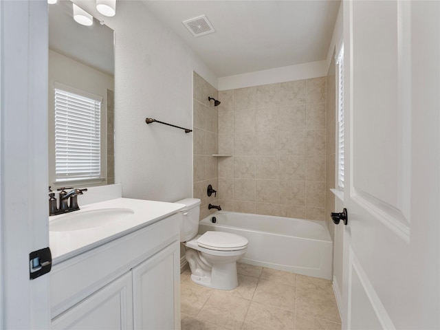 542 Freed Dr, Fate, TX 75087 - full bathroom featuring vanity, toilet, tile patterned flooring, and shower / tub combination
