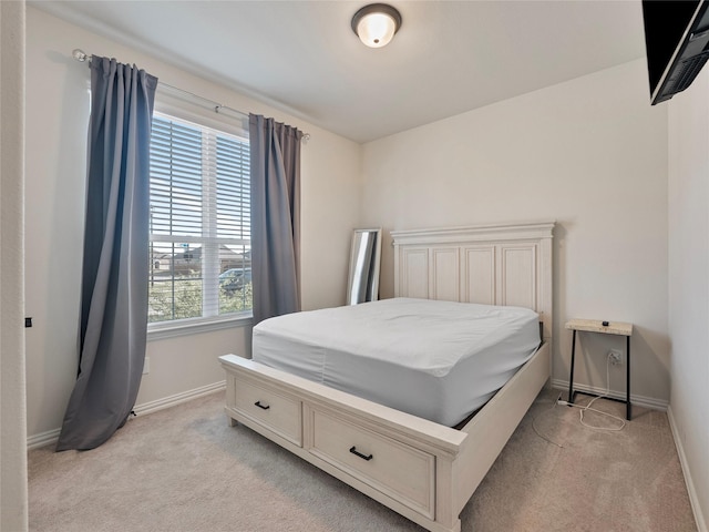 542 Freed Dr, Fate, TX 75087 - bedroom with light carpet and baseboards