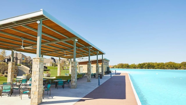 4011 Woodbine Ln, Prosper, TX 75078 - back of property featuring a residential view, a patio, and a fenced backyard
