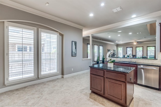 4523 W University Blvd, Dallas, TX 75209 - kitchen with stainless steel dishwasher, a sink, ornamental molding, plenty of natural light, and recessed lighting