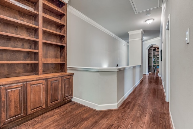 4523 W University Blvd, Dallas, TX 75209 - corridor with crown molding, dark wood finished floors, baseboards, arched walkways, and attic access
