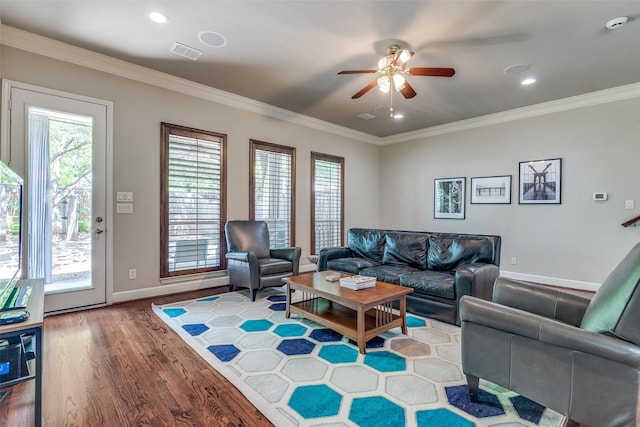 4523 W University Blvd, Dallas, TX 75209 - living area with ceiling fan, baseboards, wood finished floors, plenty of natural light, and crown molding