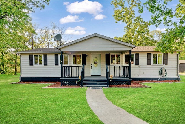 28 Private Road 45075, Powderly, TX 75473 - ranch-style house with a front lawn, covered porch, and roof with shingles