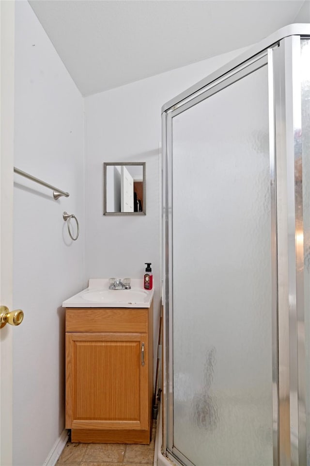 28 Private Road 45075, Powderly, TX 75473 - bathroom with vanity, tile patterned floors, and a stall shower