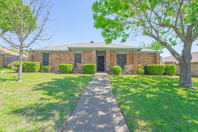 1234 Royal Oak Dr, Desoto, TX 75115 - view of front of house with brick siding, fence, and a front yard