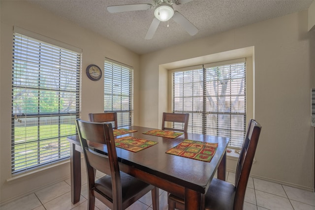 1234 Royal Oak Dr, Desoto, TX 75115 - dining area with a textured ceiling, a wealth of natural light, ceiling fan, and light tile patterned floors
