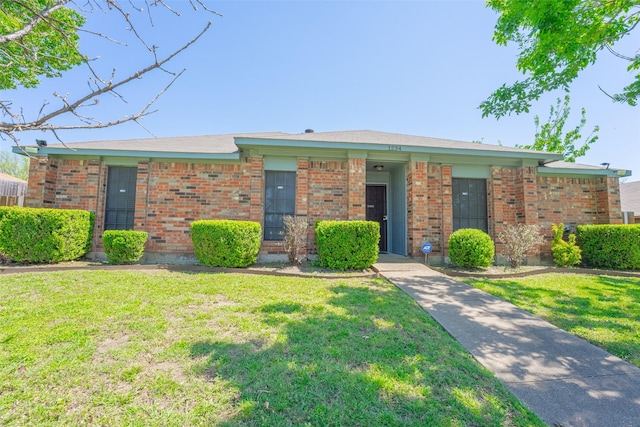 1234 Royal Oak Dr, Desoto, TX 75115 - view of front of property with brick siding and a front lawn