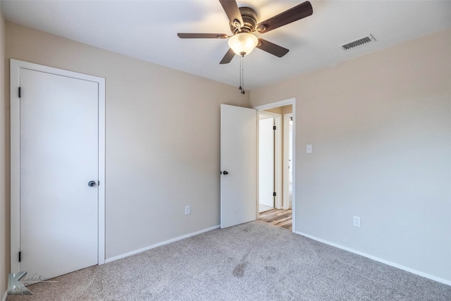 3833 Dana Ct, Abilene, TX 79606 - unfurnished bedroom with baseboards, a ceiling fan, carpet flooring, and visible vents