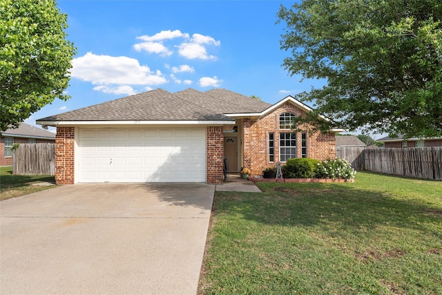 single story home featuring concrete driveway, fence, brick siding, a garage, and a front yard
