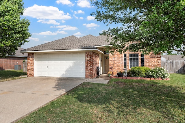 ranch-style house featuring central air condition unit, concrete driveway, fence, a garage, and brick siding