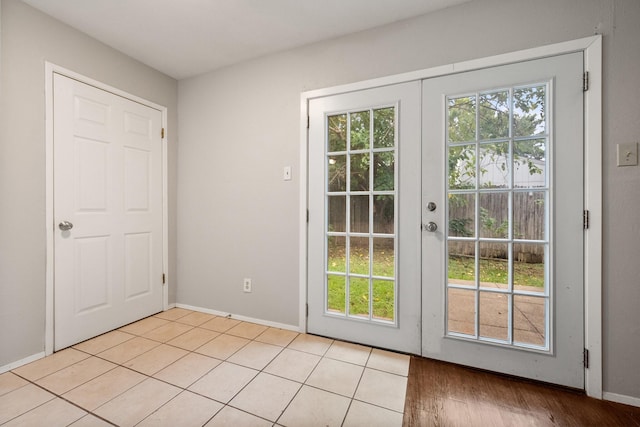 6606 Greenfield Dr, Arlington, TX 76016 - entryway with plenty of natural light, french doors, and baseboards