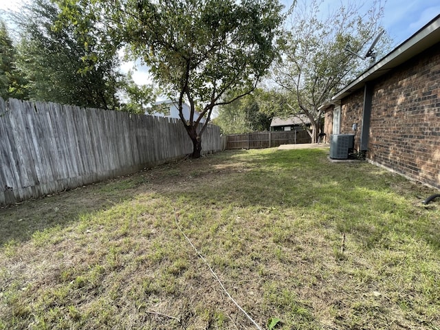 6606 Greenfield Dr, Arlington, TX 76016 - view of yard featuring a fenced backyard and cooling unit