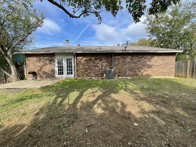 6606 Greenfield Dr, Arlington, TX 76016 - rear view of house featuring a patio area, fence private yard, french doors, cooling unit, and brick siding