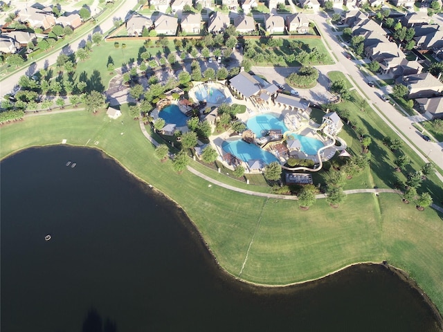 aerial view featuring a water view and a residential view