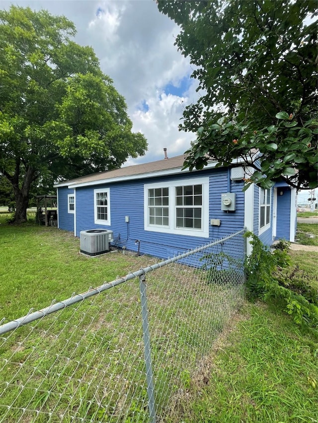 715 Elm St, Mckinney, TX 75069 - rear view of property featuring cooling unit