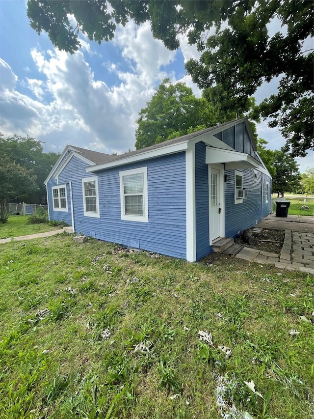 715 Elm St, Mckinney, TX 75069 - view of property exterior featuring a lawn