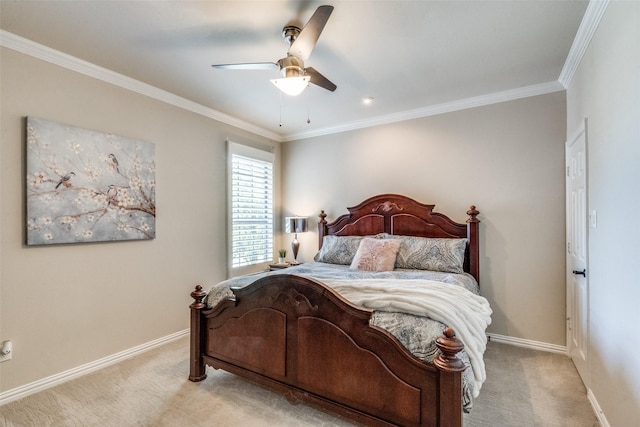 bedroom with light colored carpet, ceiling fan, baseboards, and ornamental molding