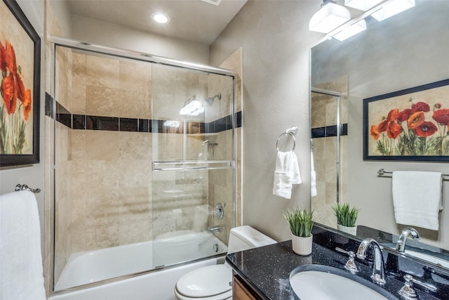 full bath featuring toilet, vanity, shower / bath combination with glass door, and recessed lighting