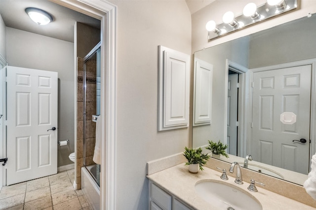 full bathroom featuring vanity and toilet