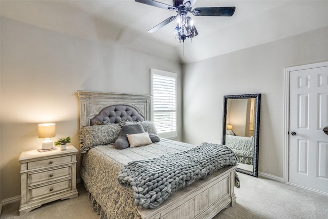 bedroom with light carpet, baseboards, and ceiling fan
