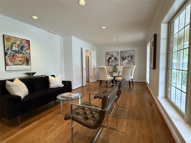 11147 Carissa Dr, Dallas, TX 75218 - living area with crown molding, wood finished floors, and recessed lighting