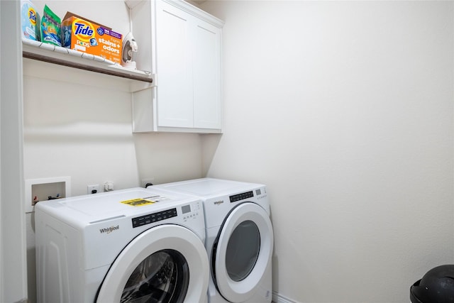 2712 Cain Dr, Anna, TX 75409 - laundry area featuring washer and dryer and cabinet space