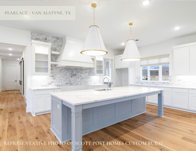 TBDLOT2 Jolene Ct, Van Alstyne, TX 75495 - kitchen with decorative backsplash, white cabinetry, and premium range hood