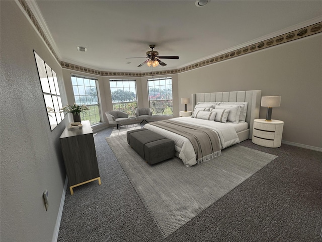carpeted bedroom featuring baseboards, visible vents, ceiling fan, crown molding, and a textured wall