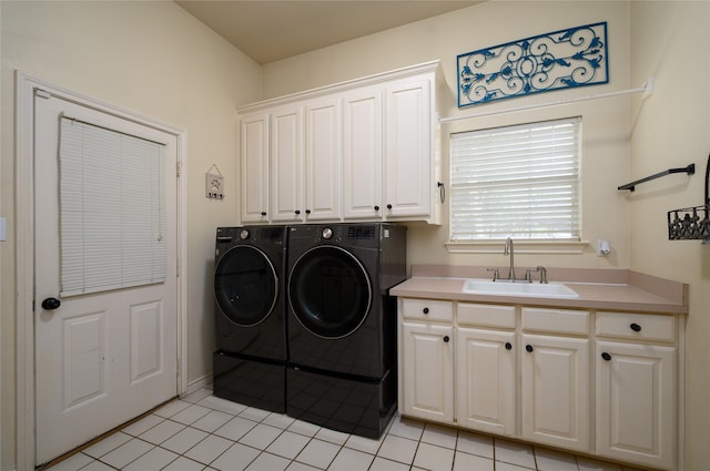 2101 Bois D Arc Dr, Sherman, TX 75092 - laundry room featuring cabinet space, washing machine and dryer, and light tile patterned floors