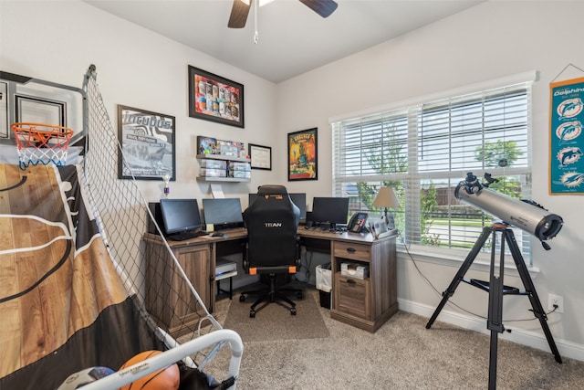 office space featuring carpet flooring, baseboards, and ceiling fan
