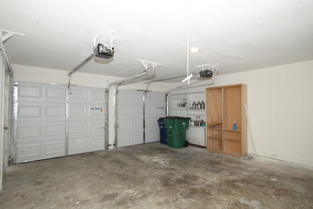garage featuring a garage door opener