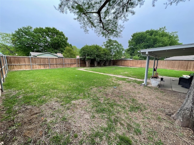 view of yard featuring a fenced backyard and a patio area