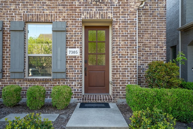 7305 Caladium Dr, Mckinney, TX 75070 - property entrance featuring brick siding