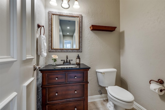 1809 Cotton Mill Dr, Mckinney, TX 75072 - bathroom featuring tile patterned floors, baseboards, vanity, and toilet