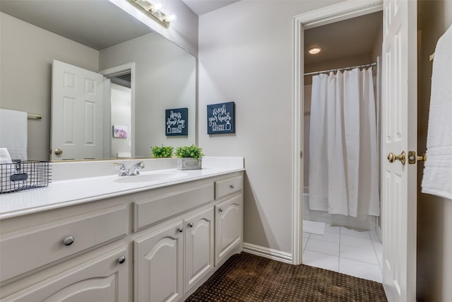 1809 Cotton Mill Dr, Mckinney, TX 75072 - full bathroom featuring tile patterned flooring, baseboards, vanity, and a shower with shower curtain