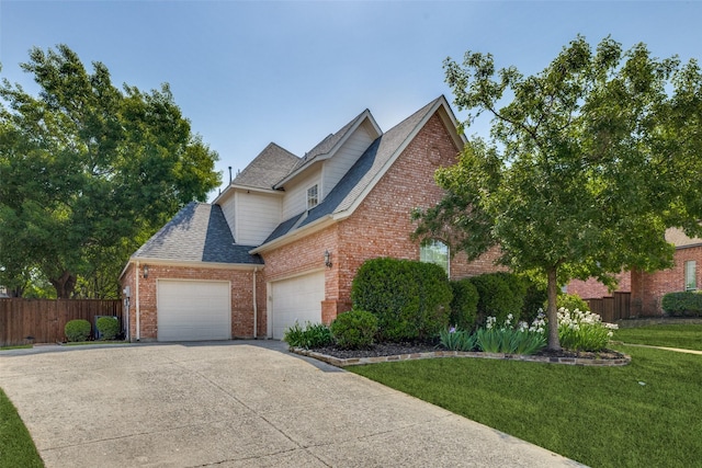 1809 Cotton Mill Dr, Mckinney, TX 75072 - traditional-style home featuring concrete driveway, brick siding, fence, and a garage