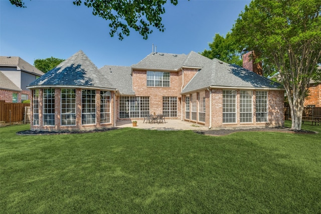 1809 Cotton Mill Dr, Mckinney, TX 75072 - rear view of property with a chimney, fence, a patio, brick siding, and roof with shingles