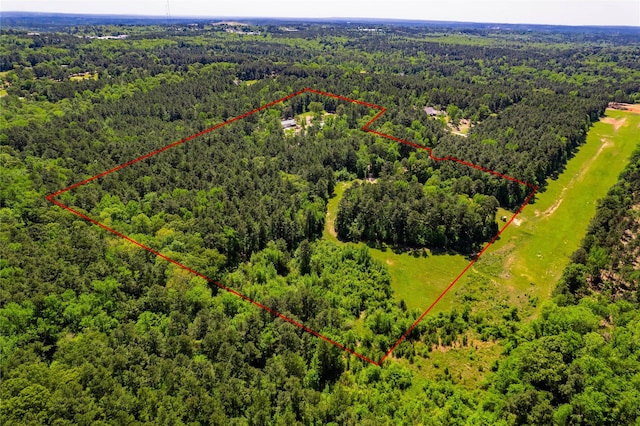 aerial view with a wooded view